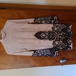 Venus dress. Black and beige. Lace patterns.  Flare arms. Size M